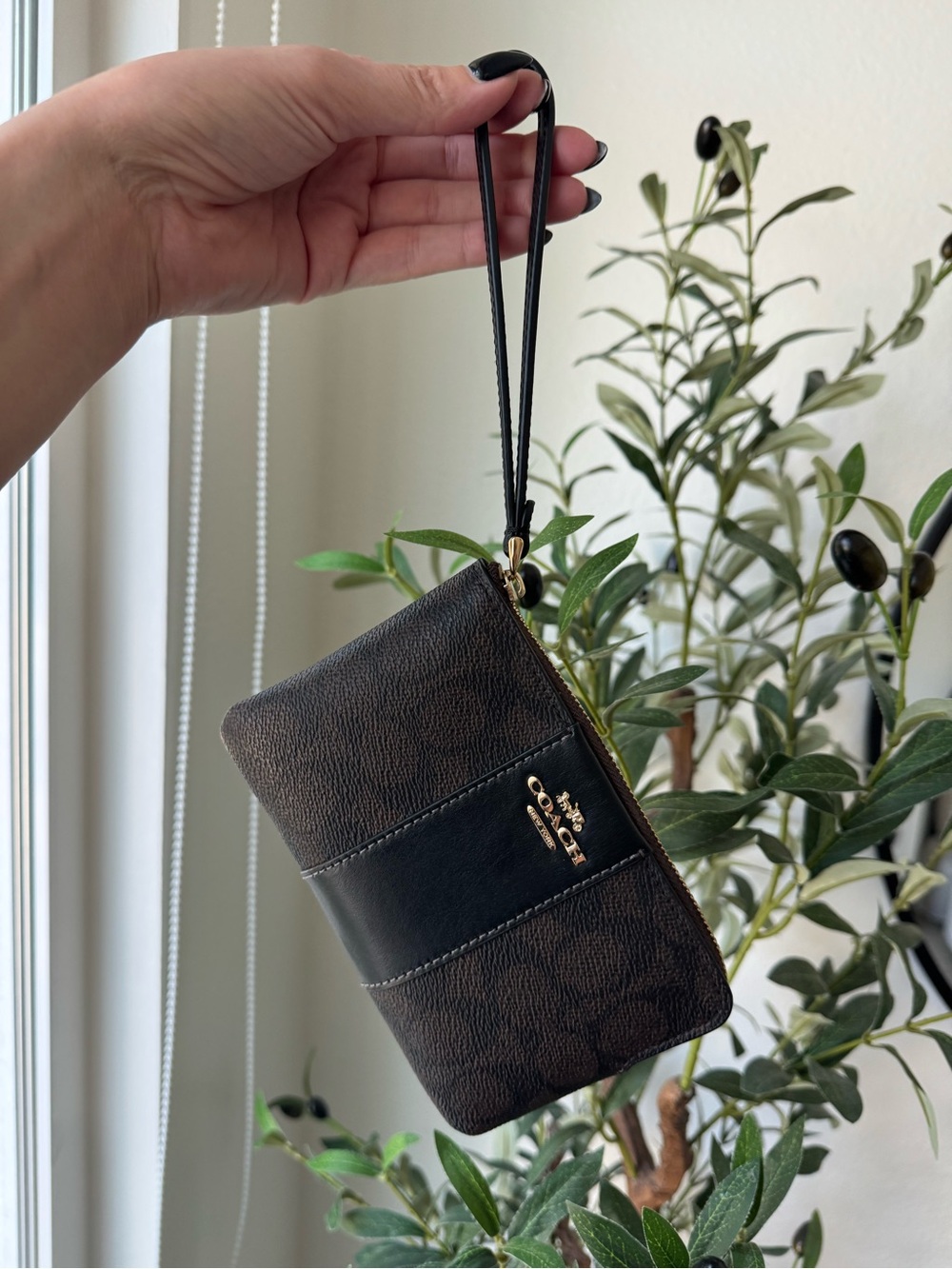 Coach Walnut & Black Corner Zip Wristlet
In Signature Canvas With Stripe